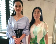 高潔與臺(tái)灣陳德商容合影